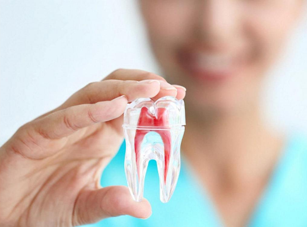 Чому виникає запалення кореня зуба без нерва?